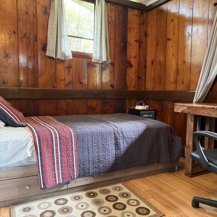 Hawaiian Anthurium Treehouse Cabin of Furnished Rentals in Hawaii centrally located between Pahoa, Hilo, and Volcanoes National Park, with views of Mauna Kea.