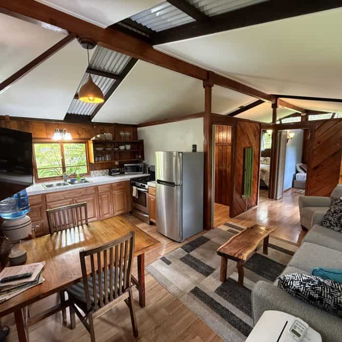 Hawaiian Anthurium Treehouse Cabin of Furnished Rentals in Hawaii centrally located between Pahoa, Hilo, and Volcanoes National Park, with views of Mauna Kea.