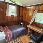 Hawaiian Anthurium Treehouse Cabin of Furnished Rentals in Hawaii centrally located between Pahoa, Hilo, and Volcanoes National Park, with views of Mauna Kea.
